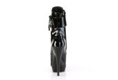Bottines fétichistes noir brillant en vinyle haut de gamme idéales pour shows drag et scène. Bottines fétichistes noir brillant en vinyle haut de gamme idéales pour shows drag et scène.