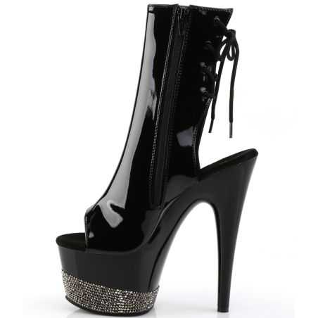 Bottines de scène noir brillant en vinyle à triple effet de texture et zip pour shows drag.