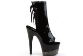 Bottines de clubbing haut de gamme noir laqué pour performances de cabaret et pole exotique. Bottines de clubbing haut de gamme noir laqué pour performances de cabaret et pole exotique.