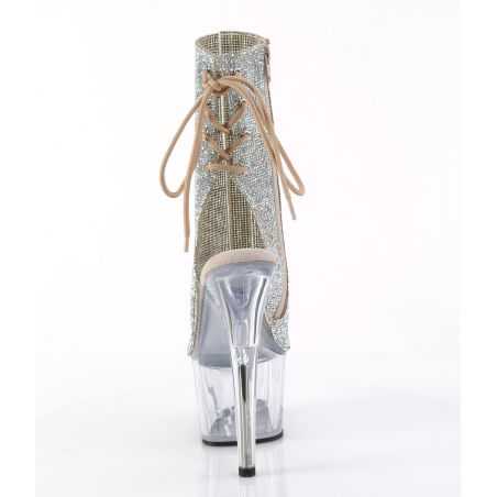 Bottines fétiches à paillettes dorées et découpe open toe adaptées à toutes les morphologies d'artistes.