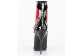Bottines de cabaret bicolores vinyle rouge et noir à fermeture éclair latérale signées LBDHT. Bottines de cabaret bicolores vinyle rouge et noir à fermeture éclair latérale signées LBDHT.