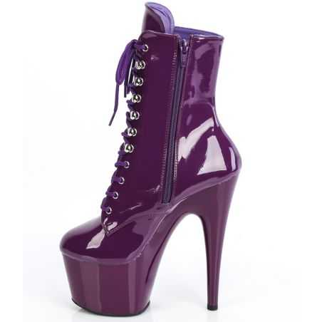 Bottines de scène rose brillant en vinyle avec fermeture éclair latérale pour spectacles drag.