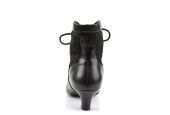 Bottines de spectacle noires à lacets et bout pointu au design rétro chic signé LBDHT.